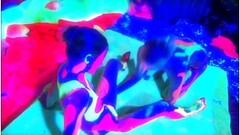 Surrealistic looking film with black light paint and lesbians Thumb