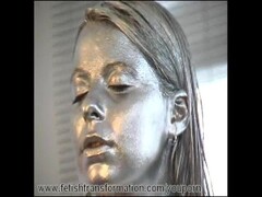 Big breast girl complete painted in silver Thumb