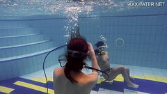 Adeline being filmed by a girl in the pool Thumb